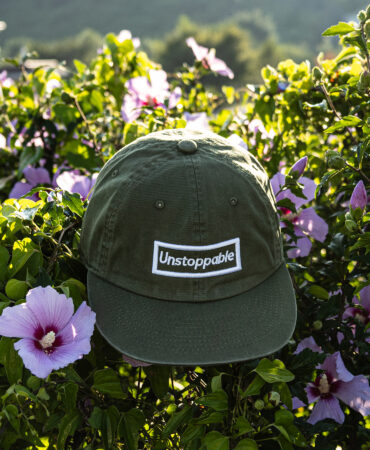 언스탑퍼블 박스로고 평챙 플랫캡 아미카키 (UNSTOPPABLE box logo flat cap)