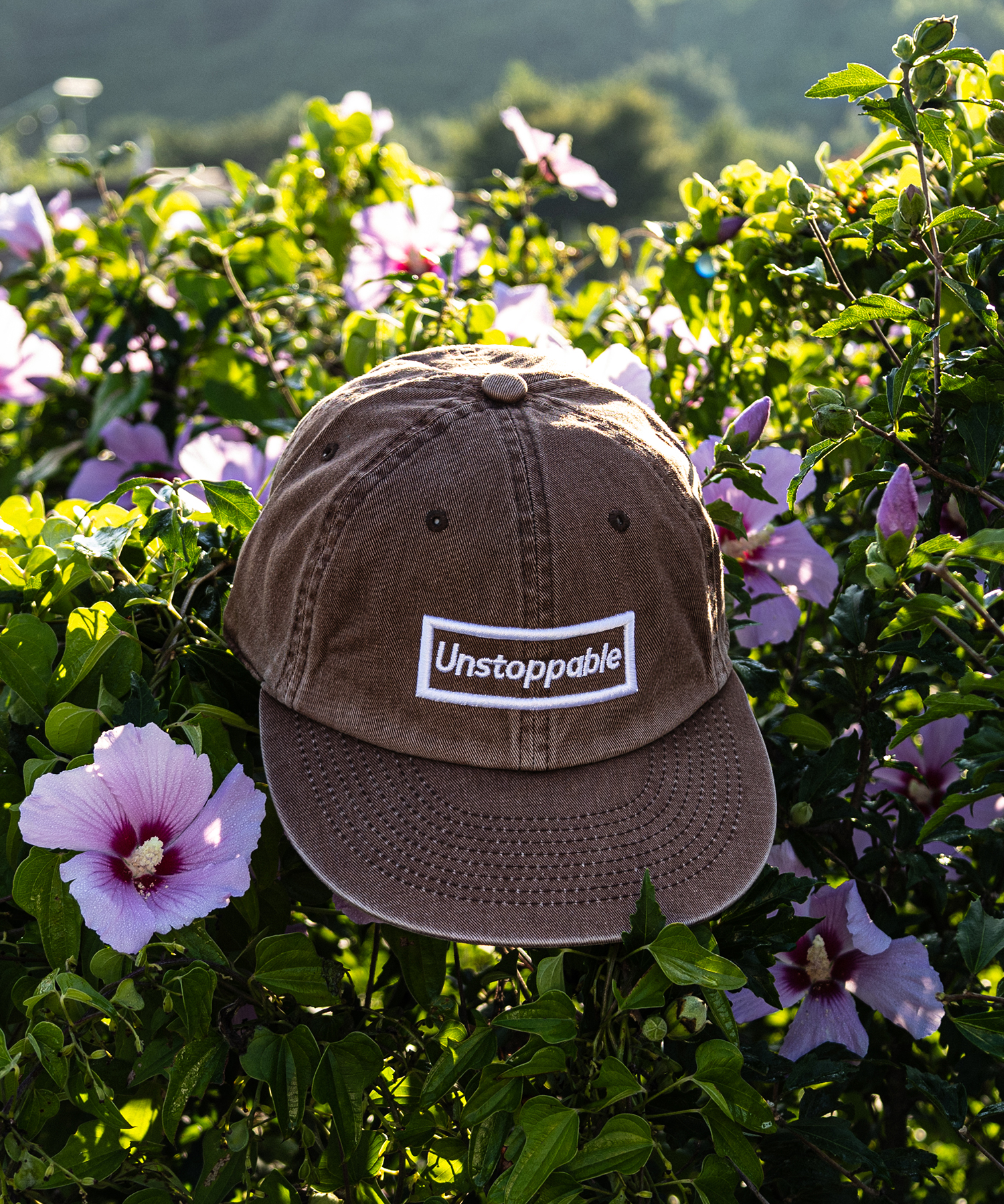 언스탑퍼블 박스로고 평챙 플랫캡 엔틱브라운 (UNSTOPPABLE box logo flat cap)