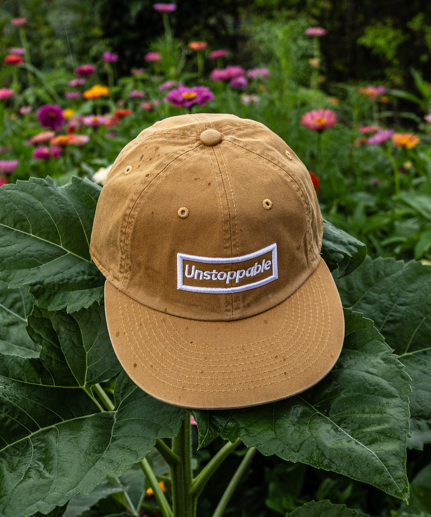 언스탑퍼블 박스로고 평챙 플랫캡 캐러멜 (UNSTOPPABLE box logo flat cap)